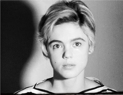 Andy Warhol MOOC: Black and white photo of Edie Sedgwick in a striped top, gazing softly at the camera