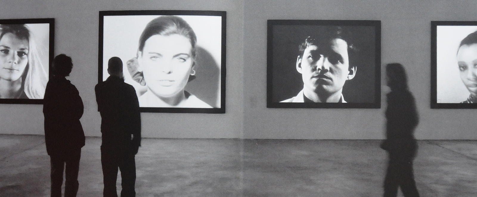 black-and-white photo, installation view of Andy Warhol: Motion Pictures, KW ICA, Berlin, 2004