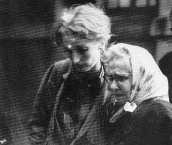 She Shot Andy Warhol: black and white photograph of Viva and Julia Warhola looking sad, forlorn & grief stricken